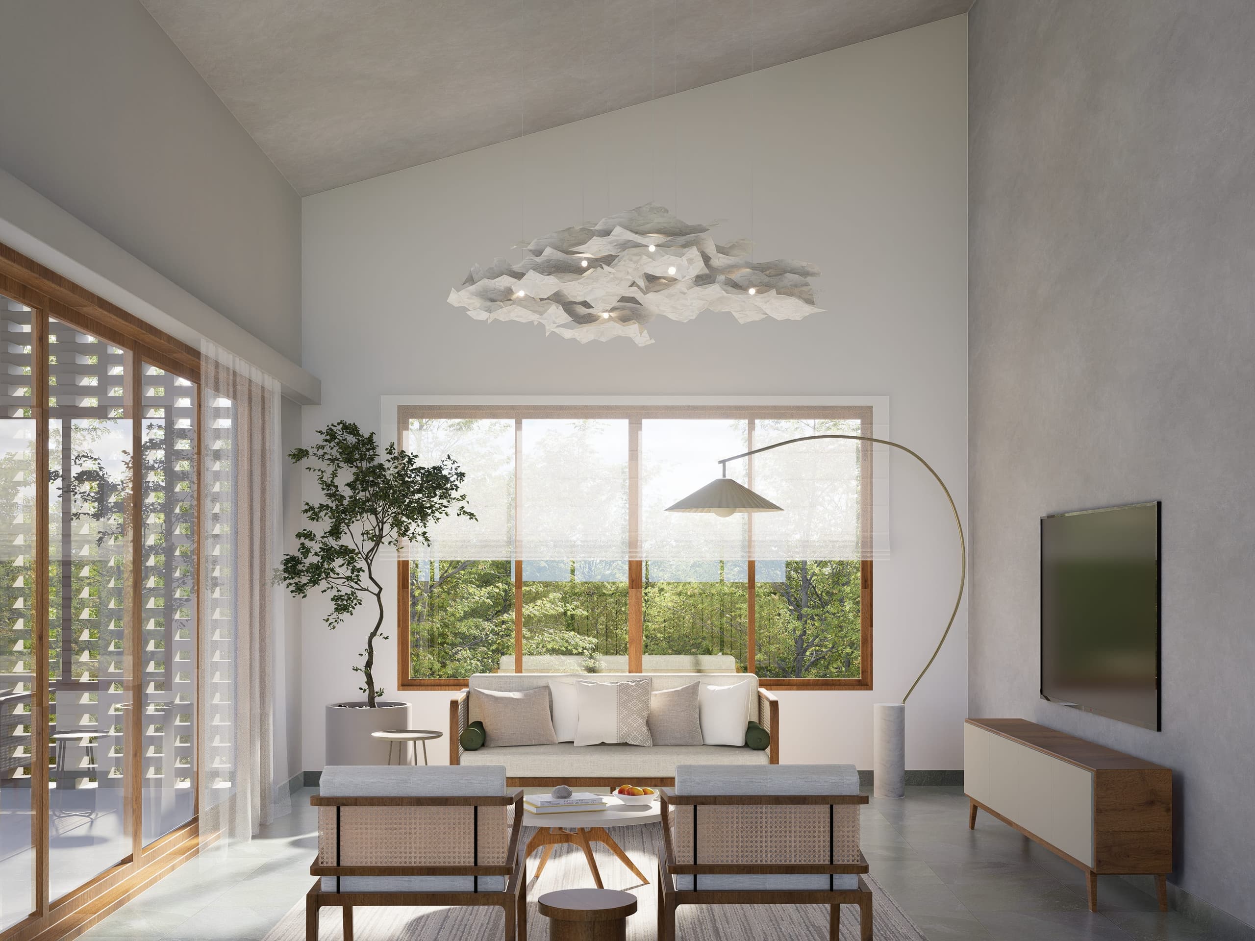 The double-height family room holds the plantation canopy in a large picture window. A sculptural pendant floats within the void above; louvred doors to the left open the space directly onto the deck.