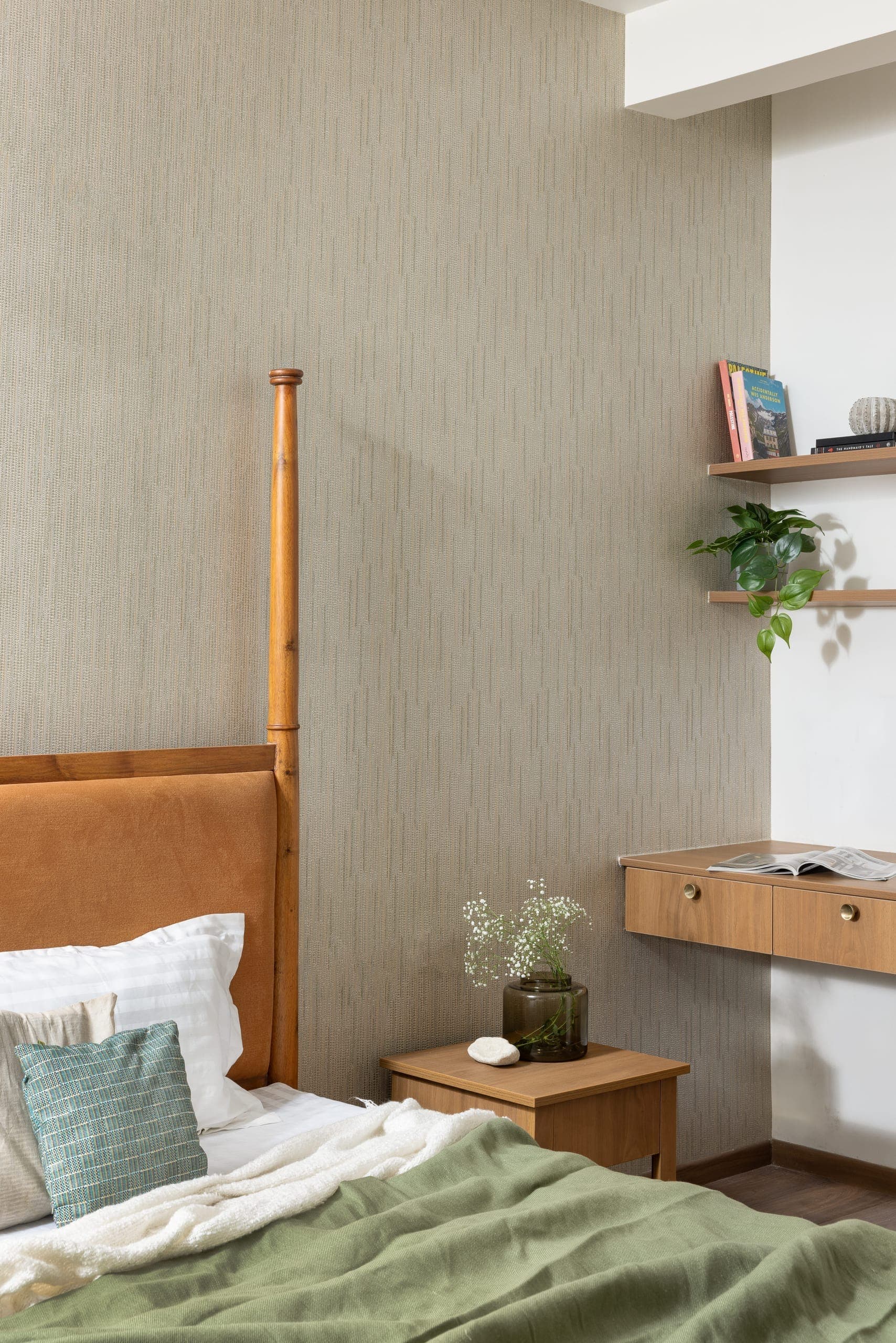 The bedrooms continue a restrained language, shifting toward softer textures and more personal expression.