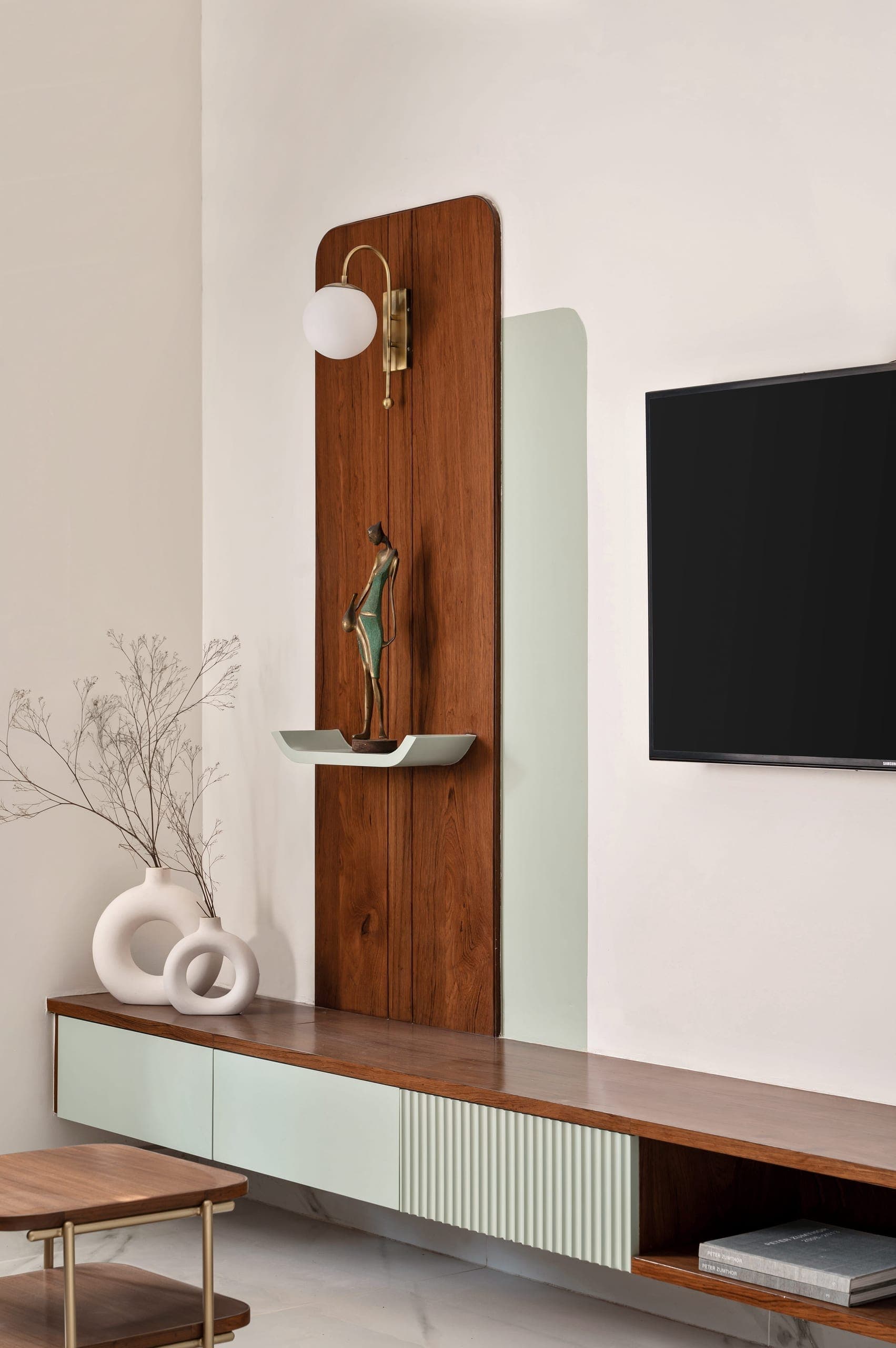 The living and dining areas are designed to feel warm, comfortable, and easy to use. Furniture balances softness with function, creating spaces that are both practical and inviting.